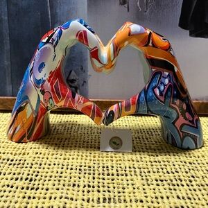 Colorful Heart-Shaped Sculpture by: Artza.